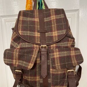 “Under one sky”Rucksack backpack in a brown plaid pattern ,vegan leather accents